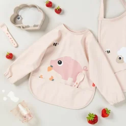 Done by Deer Bavoir à manches avec poche Tiny farm Rose