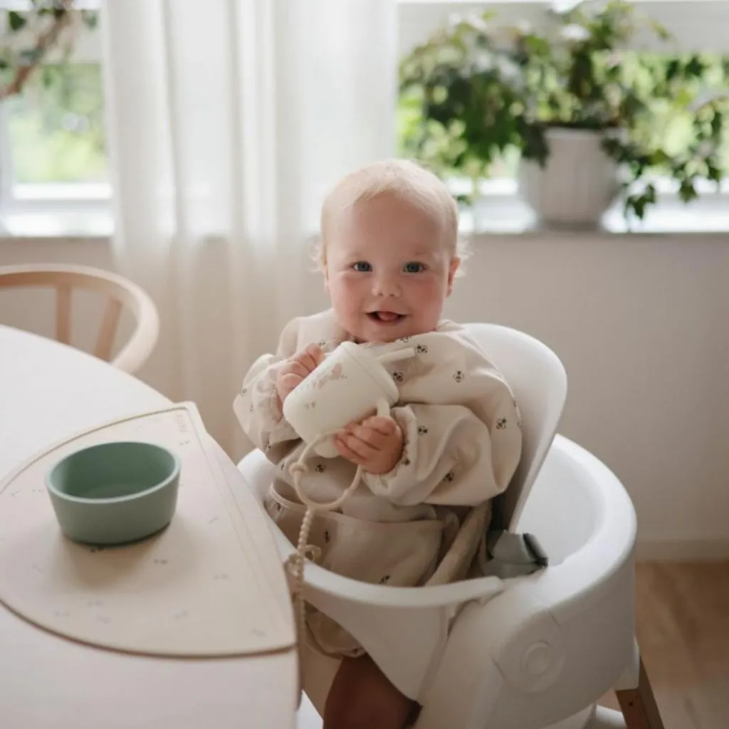 Mushie Bavoir à manches longues Bees (6-24 mois)