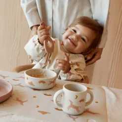 Liewood Bavoir à manches Merle Dream Ecru