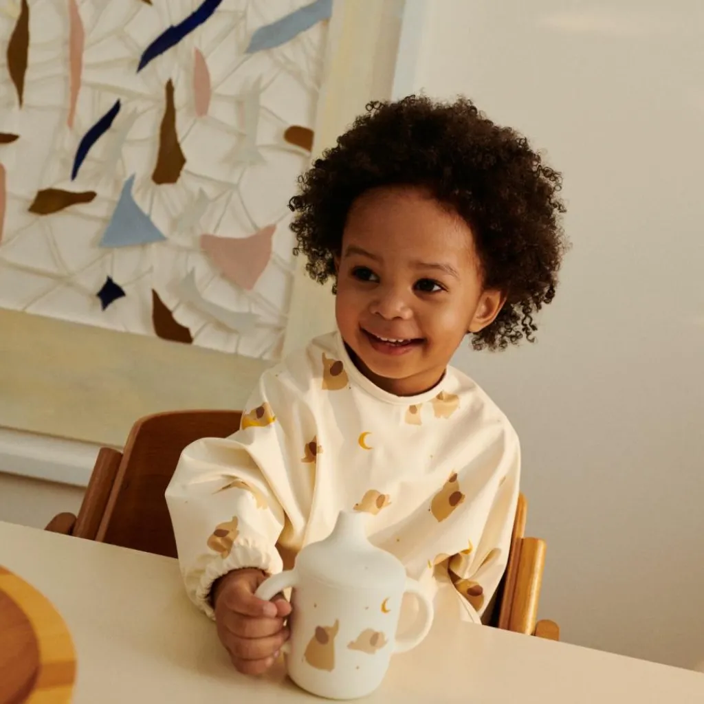 Outlet Bavoir à manches Merle Elephant Crème de la crème Bavoirs