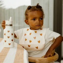 Atelier Wagram Bavoir en silicone Coeurs Crème