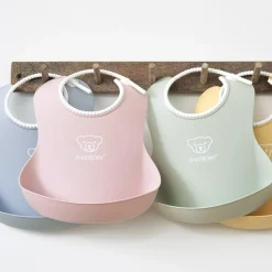 BabyBjörn Bavoir plastifié à poche vert pastel