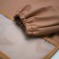 Trois Kilos Sept Bavoir plastifié manches longues Terracotta