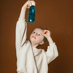 Petit Boum Bouteille sensorielle Float Turquoise