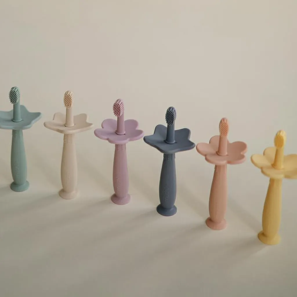 Mushie Brosse à dent d'apprentissage étoile Shifting sand