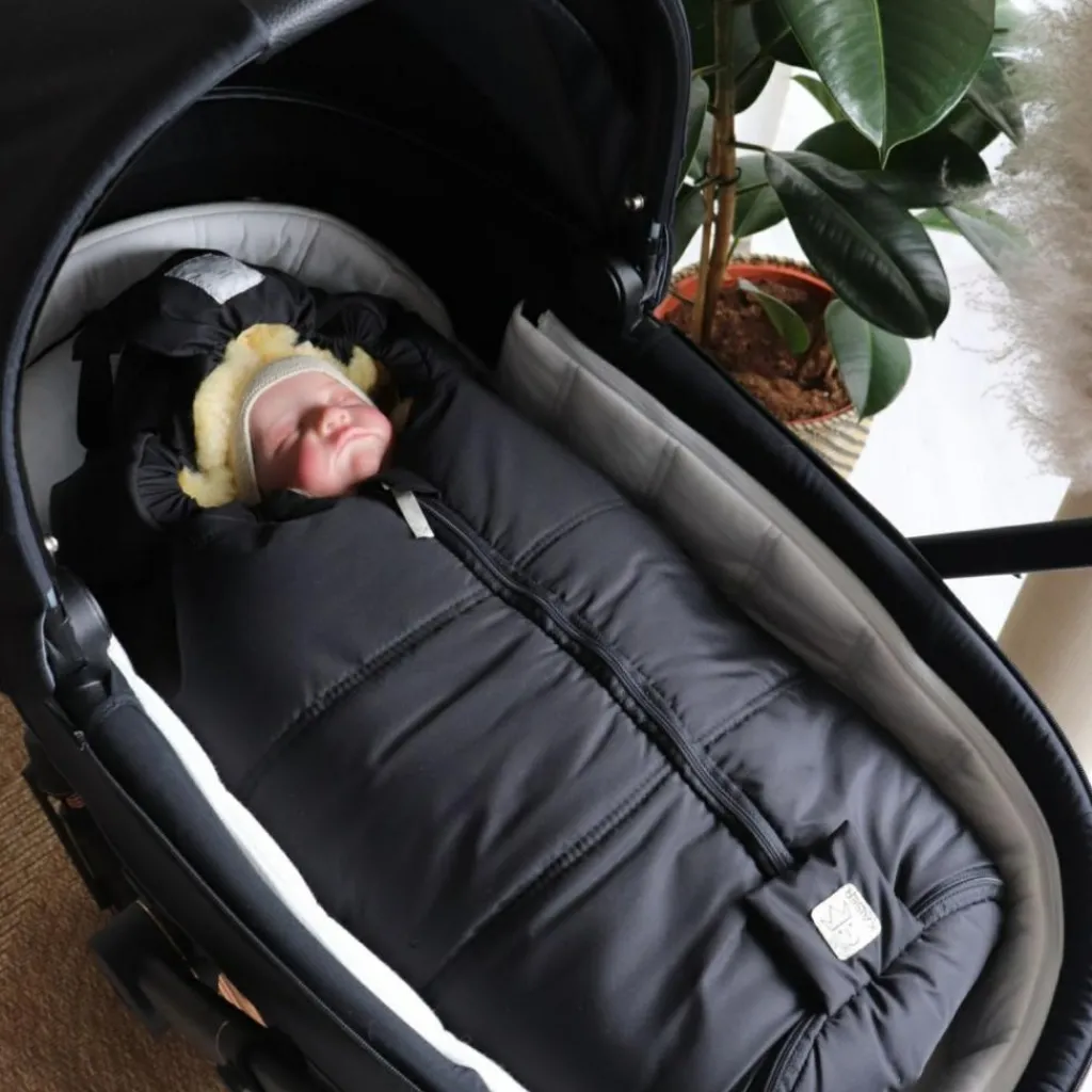 Kaiser Chancelière pour siège-auto bébé en peau d'agneau NAADJA noir