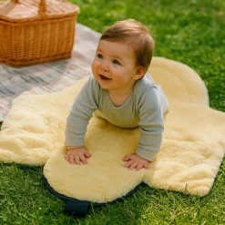 Hot Chancelière pour siège-auto bébé en peau d'agneau NAADJA crème Chancelière Cosy