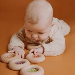 Hochet sensoriel Sensory Donut Grappes de raisin Bouteille Sensorielle