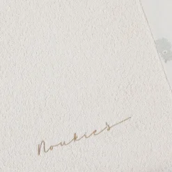 Noukie's Housse de matelas à langer en éponge écrue