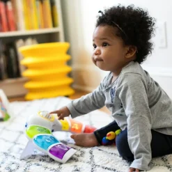 Baby Einstein Jouet musical et multilingue Glow & Discover