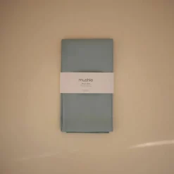 Mushie Tapis anti-éclaboussure Roman Green (108 x 108 cm)