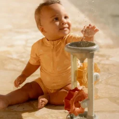 Little Dutch T-shirt de bain anti-UV manches courtes Seashells Sunny Yellow (6-12 mois)